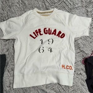 Hollister White 'LIFE GUARD' Graphic mens Sweatshirt with Red and Orange Accents